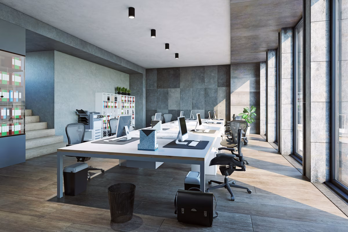 Sleek modern workspace with white desks, ergonomic chairs, and large windows
