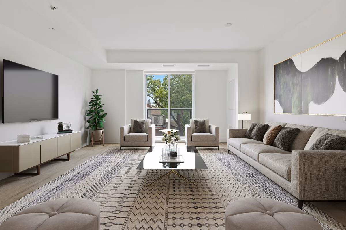 Modern living room with geometric rug and grey sectional