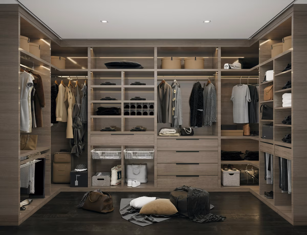 Luxury U-shaped walk-in closet with dark wood finish and LED lighting