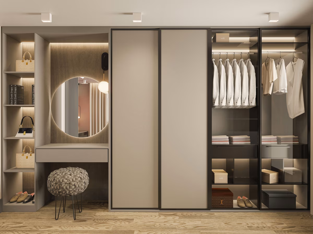 Modern wardrobe with glass display sections, vanity area and LED lighting
