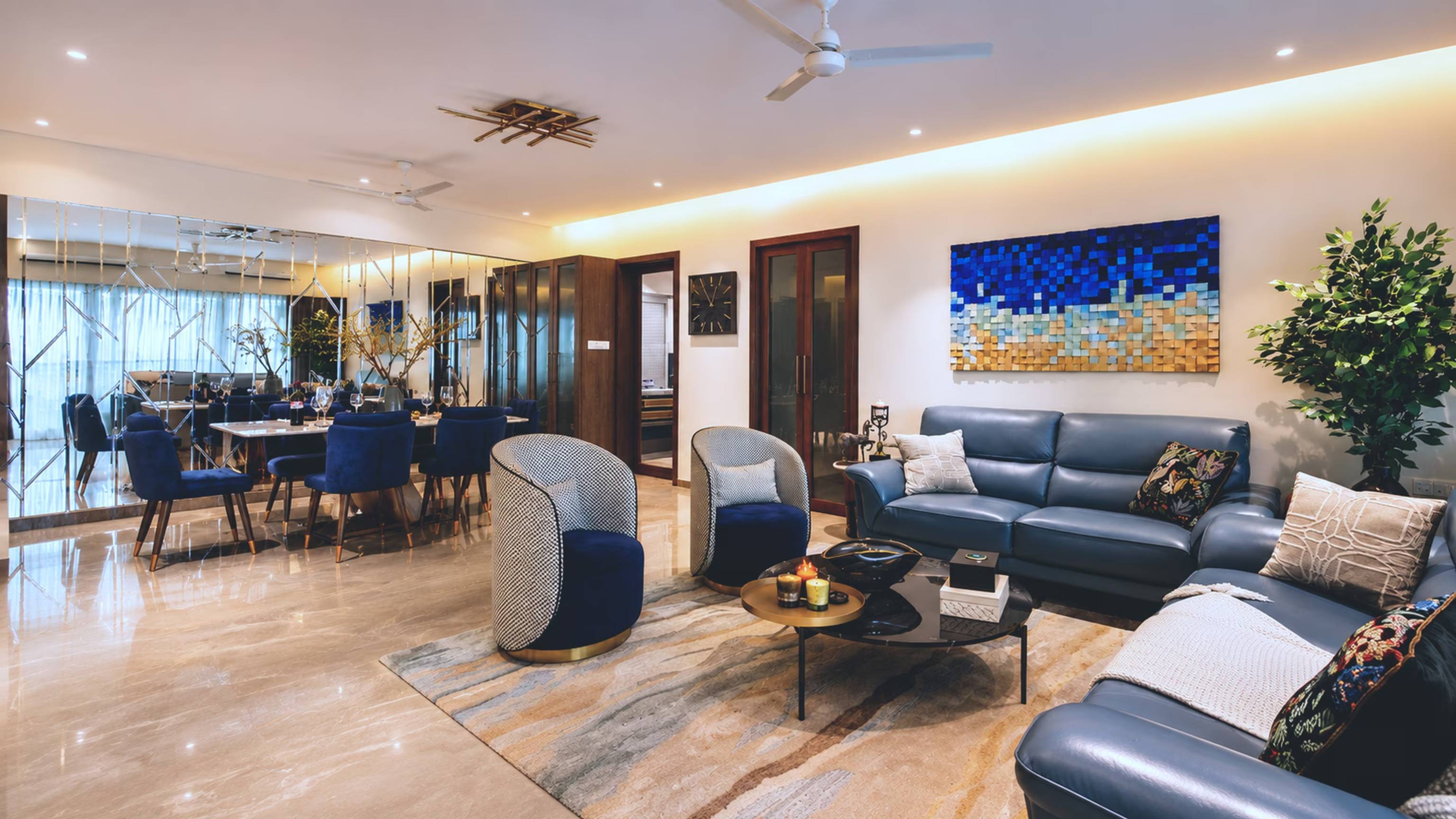 Modern living and dining room interior design for homes and villas by ASK Design and Build