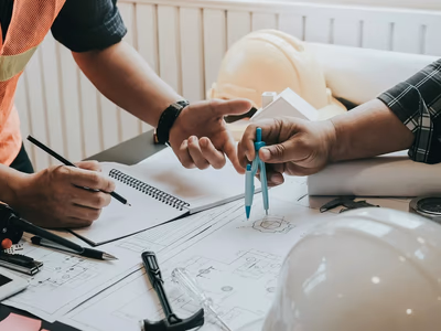 Professional project management team coordinating commercial renovation project