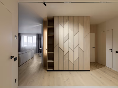 Custom-built wardrobe with smart storage solutions and organized compartments for clothes and accessories