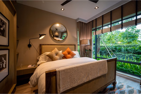 Zen-inspired bedroom with earth tones and garden views