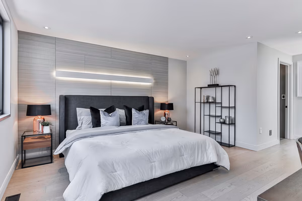 Industrial modern bedroom with LED lighting and metal furniture