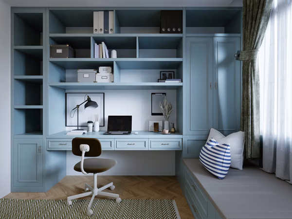 Modern teen bedroom with powder blue built-in study area and window seat