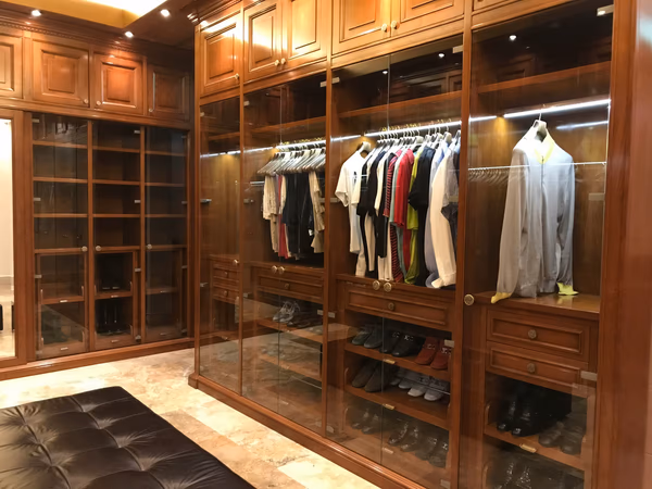 Classic mahogany wardrobe with glass doors and LED lighting